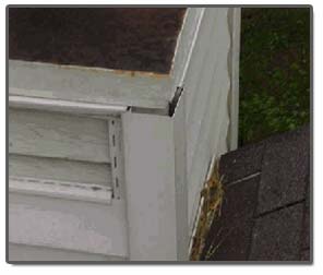 Old chimney chase pan allows siding to protrude outside of chase edge